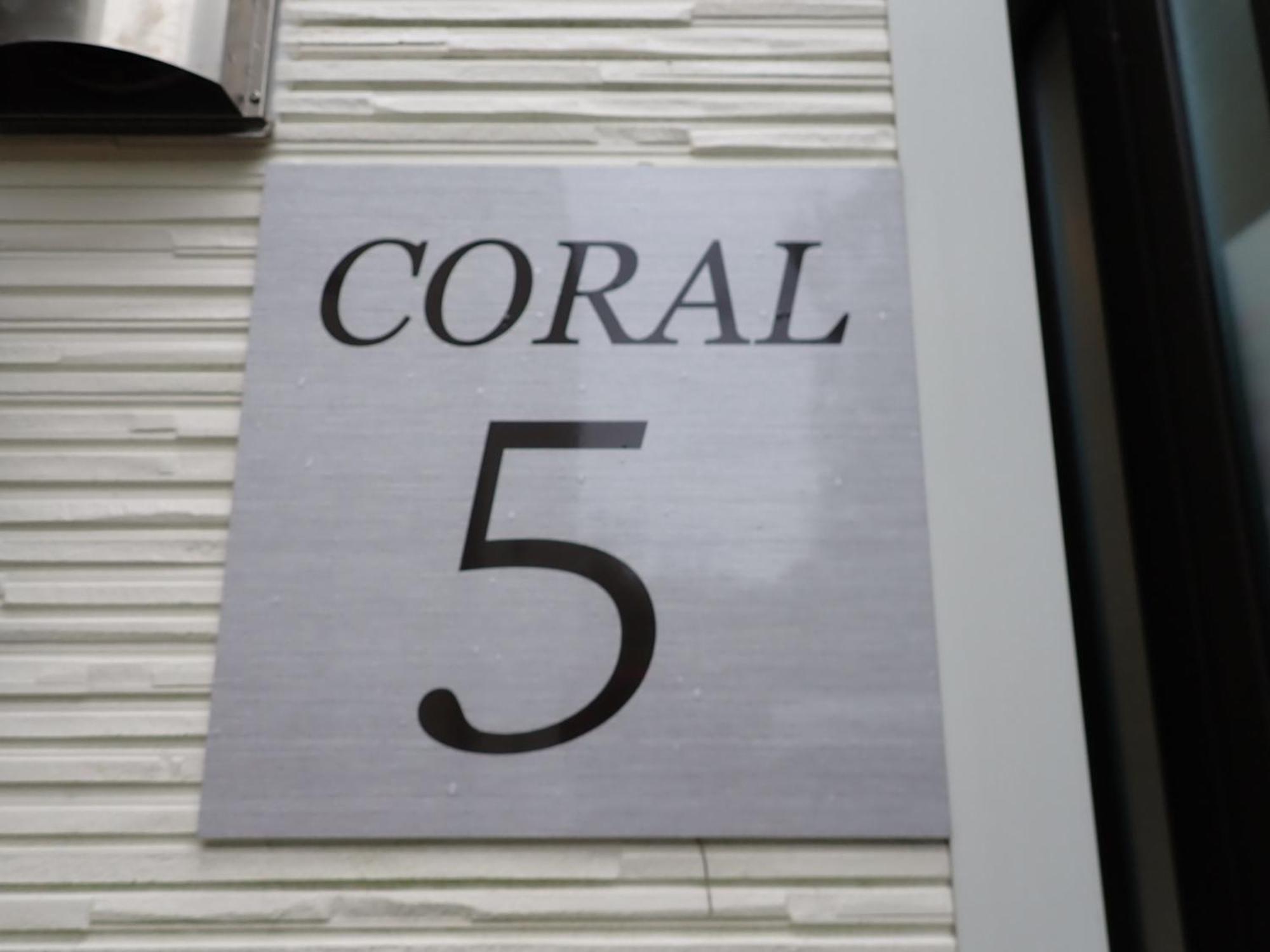 Coral Apartment Onna Bagian luar foto